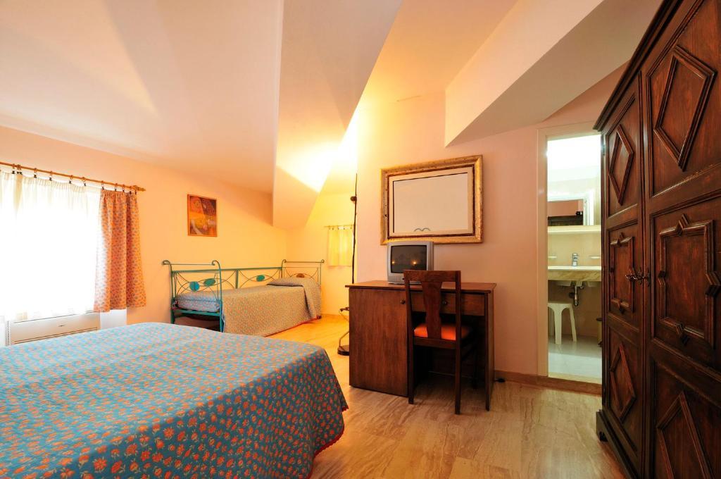 Hotel Fuile 'E Mare Cala Liberotto Habitación foto